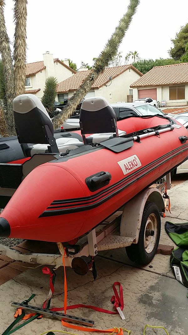 Inflatable boat 14' aluminum floor,with trailer and 20hp mercury for