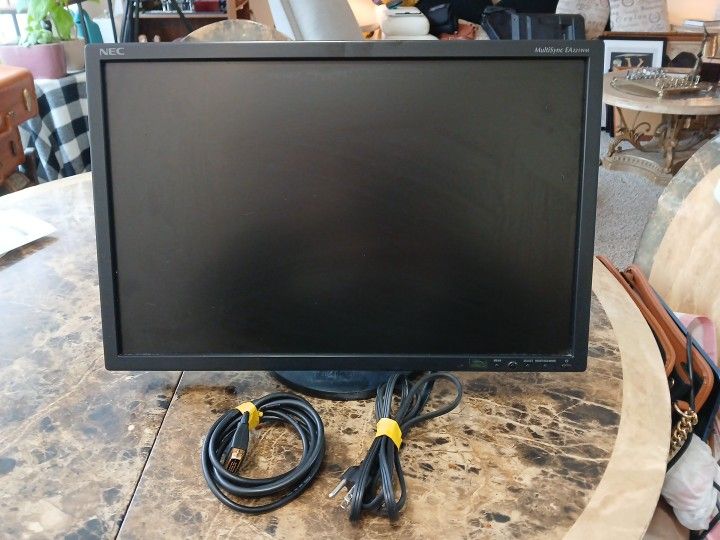 NEC 22inch MultiSync EA221WM Monitor (TESTED)
This is a NEC MultiSync EA221WM 22-inch widescreen LCD monitor in black color. It is fully tested and