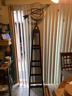 Wrought iron vintage Armillary with multiple shelves for display. Never been used outside, has brushed distressed design with removable shelves. This 