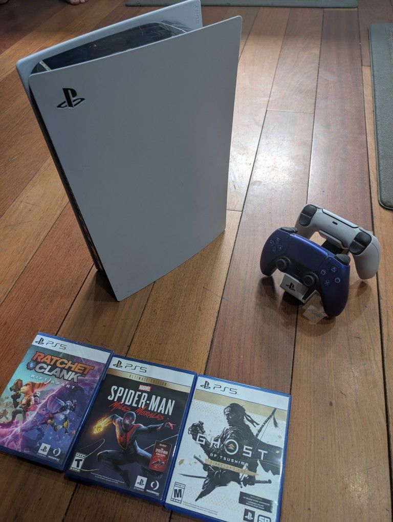 Playstation 5 Disc Edition With Two Controllers, Charging Dock, And Three Games