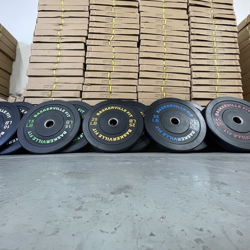 NEW 260lb set of Olympic Bumper Plates sealed in the manufacturer box  