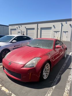 Red 2004 Nissan 350z (Automatic)