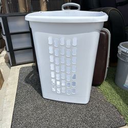 Tall Sterilite Laundry Baskets With Wheels And Extendable Handle.
