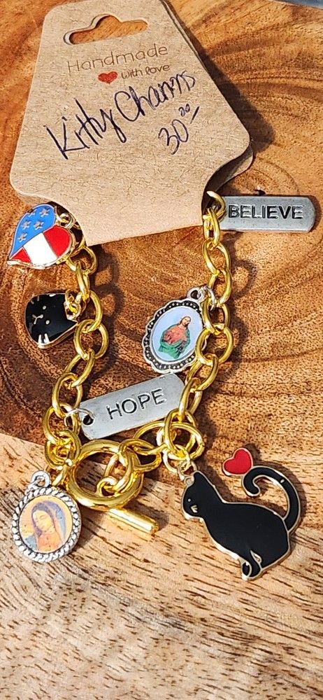 Charm Bracelets With Cats, American flags, Inspirational Words and Saints 