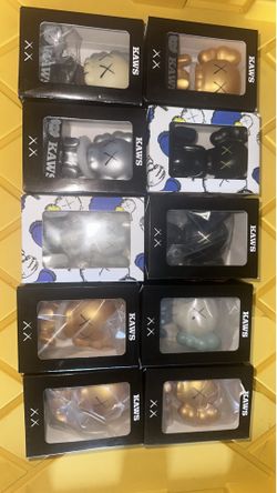 Kaws bobble heads