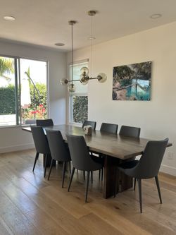 Crate and Barrel 108" wooden walnut dining room table.