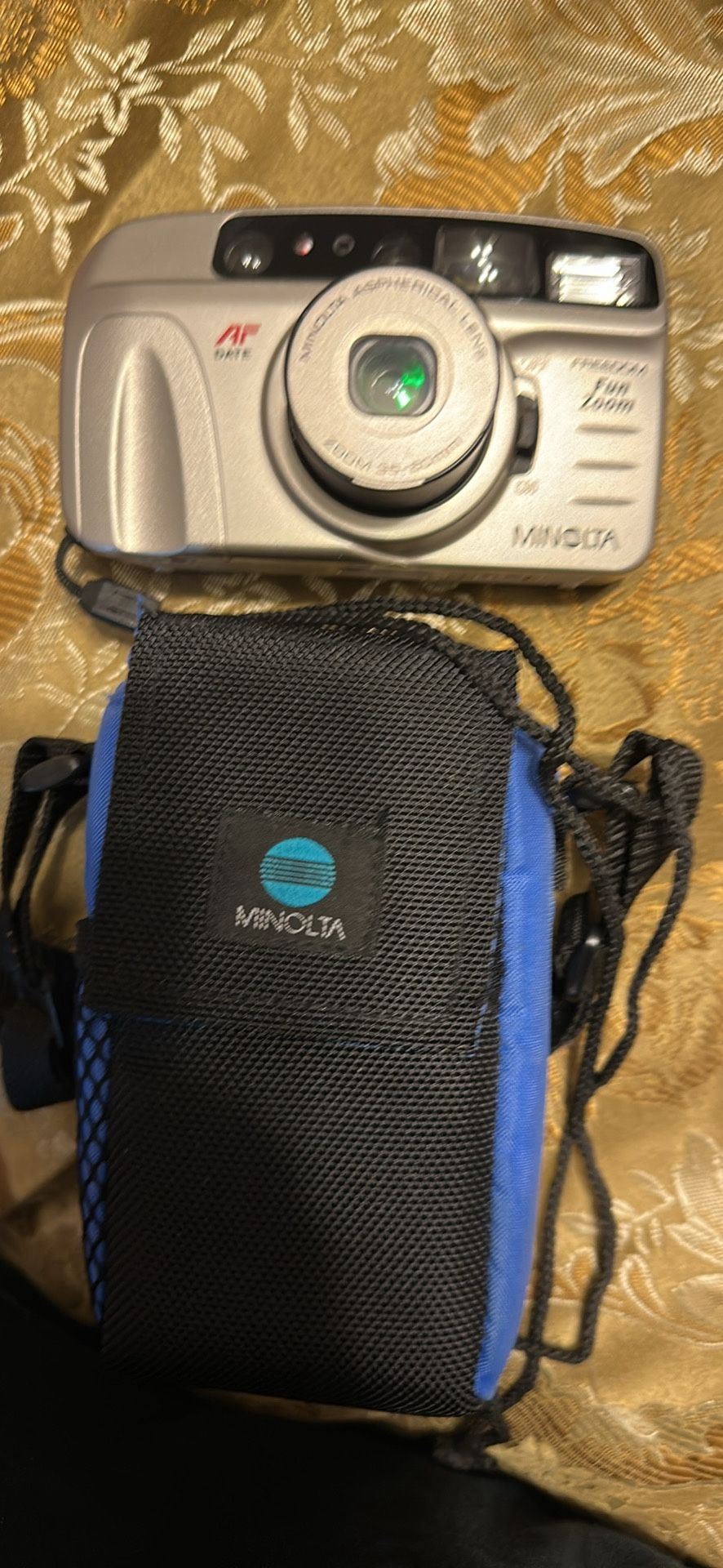 Minolta Freedom Fun Zoom AF Date 35-60mm, a 35mm point-and-shoot film camera. It's designed for easy use, featuring autofocus,zoom lens,build in Flash