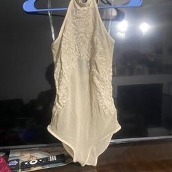 Nude color small bodysuit must pick up Coors and Rio bravo