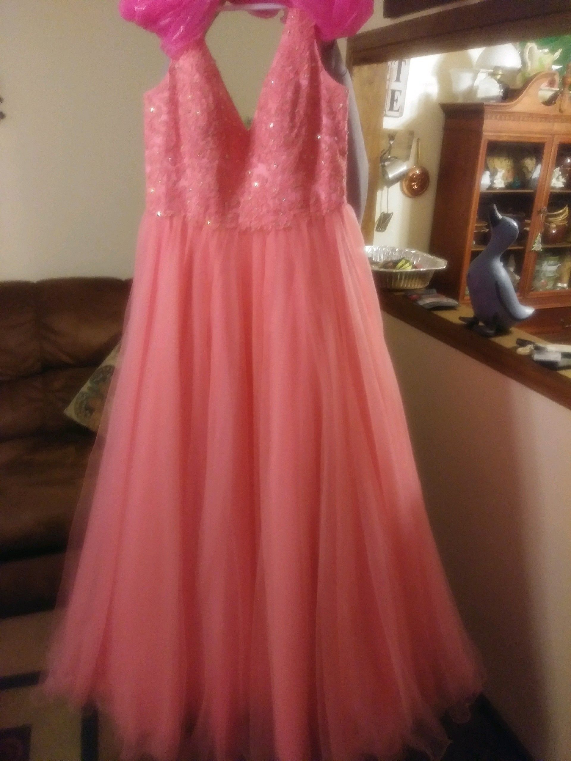 Prom dress altered size 16 worn 1 time then cleaned and stored in dress bag.