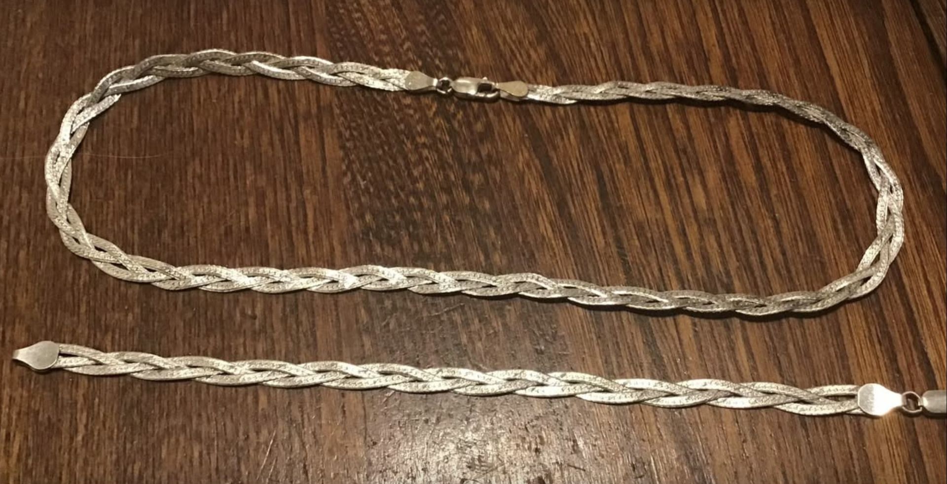 Sterling three strand braided chain (16 inches) and matching bracelet (7 inches) marked made in Italy