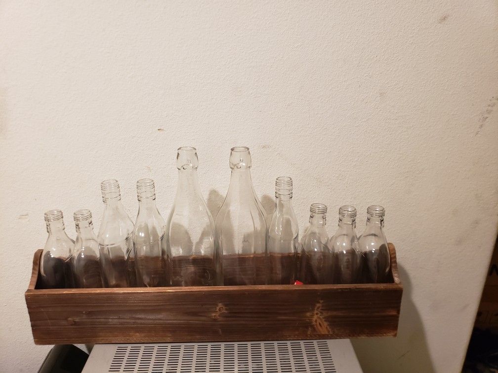 RUSTIC VINTAGE BOTTLE RACK AND BOTTLES