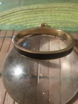 Coach bracket color blk and gold trim  !! 