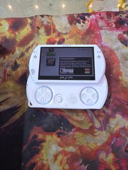 Sony PSP Go console 16GB Great Appearance - Tested 100% Working White 6 games and charger