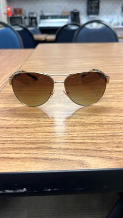 Brand new tory Burch, sunglasses with original sunglasses case.