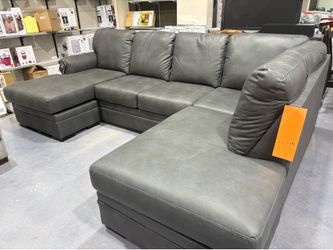 Lofton-pike by Ashley sectional water and scratch resistant