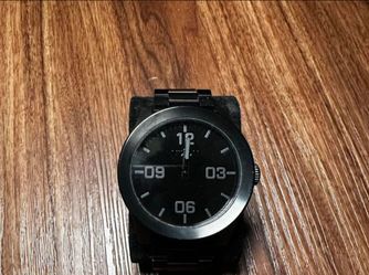 All black Nixon Corporal Watch