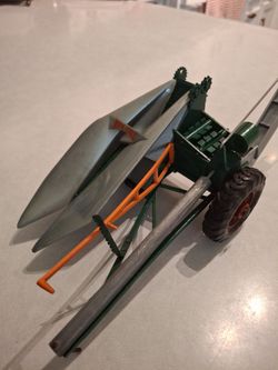 New idea one row corn picker