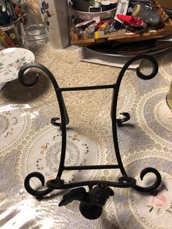 Castiron book or tablet holder .