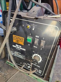 WELDER w/trolly cart