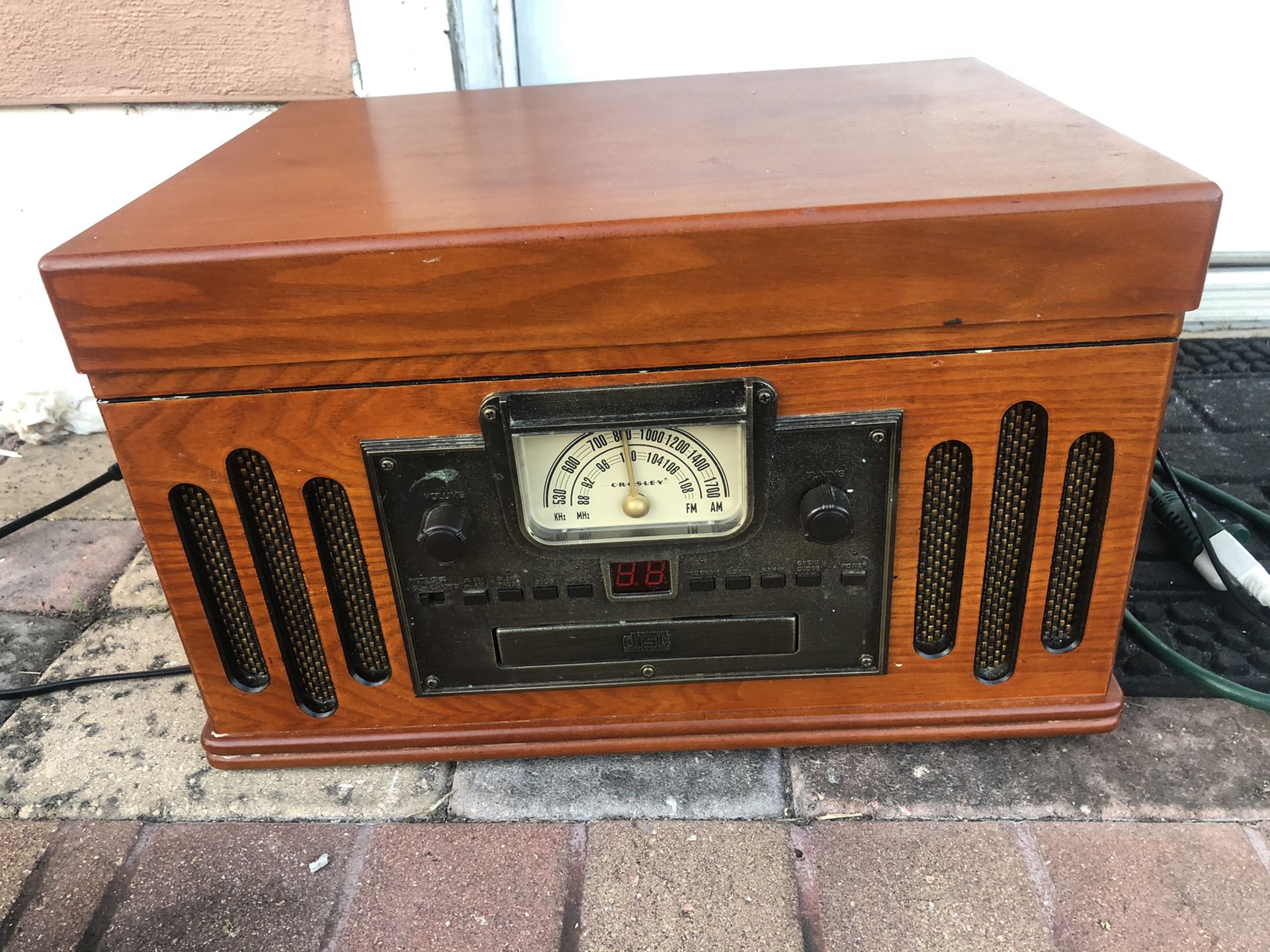 Crowley old radio radio, CD player, and small record player...