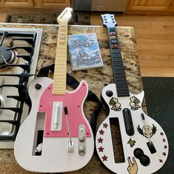 2 Wii Guitars and Game 