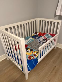 White full crib with extra toddler front