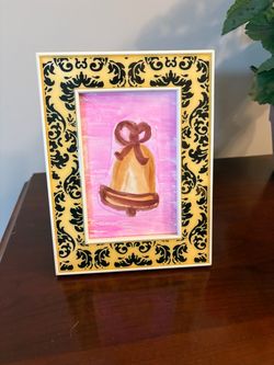 Hand painted Christmas themed symbols In a frame- 2 count