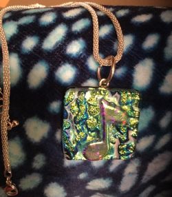 Large dichroic glass pendant on silver rope necklace