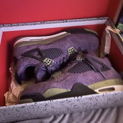 Women canyon purple air Jordan 4  retros. 