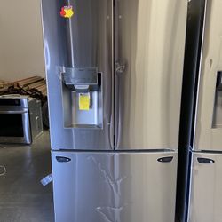 LG Never Use refrigerator .have Dent. But Works Great !only $1400
