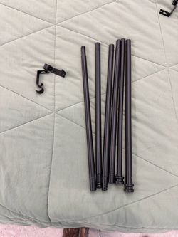3 sets of rods and blackout curtains dark blue