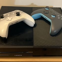 Xbox One console With Two Controllers And Cords. 