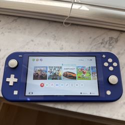 Nintendo Switch. New Condition With Games