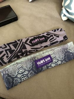 Set of 2 new Violet Love workout headbands both for 12.00 retail for 25 ea