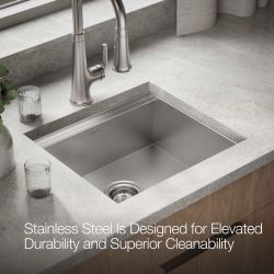 New stainless steel workstation bar sink is a Kohler Lyric model RH23377. This 22-inch by 21-inch sink has a 7.5-inch bowl depth and is designed for d