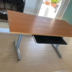Ikea Galant desk in used condition with some normal wear and tear. T style height adjustable legs. All hardware included as well as a couple extra ext
