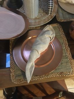 Copper color charger plates. Set of 4. Very chic!