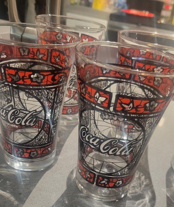 Coca cola jug and cups