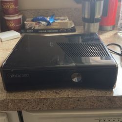 Xbox 360, no controllers, 7 lego games and power cord included