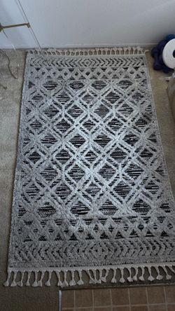 Boho Moroccan area rug with tassels