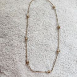 Vintage Avon love knot And Chain Fall gold tone necklace 
