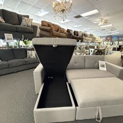 Sectional With Pull Out Bed And Storage 