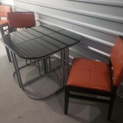 Table And Four Chairs 