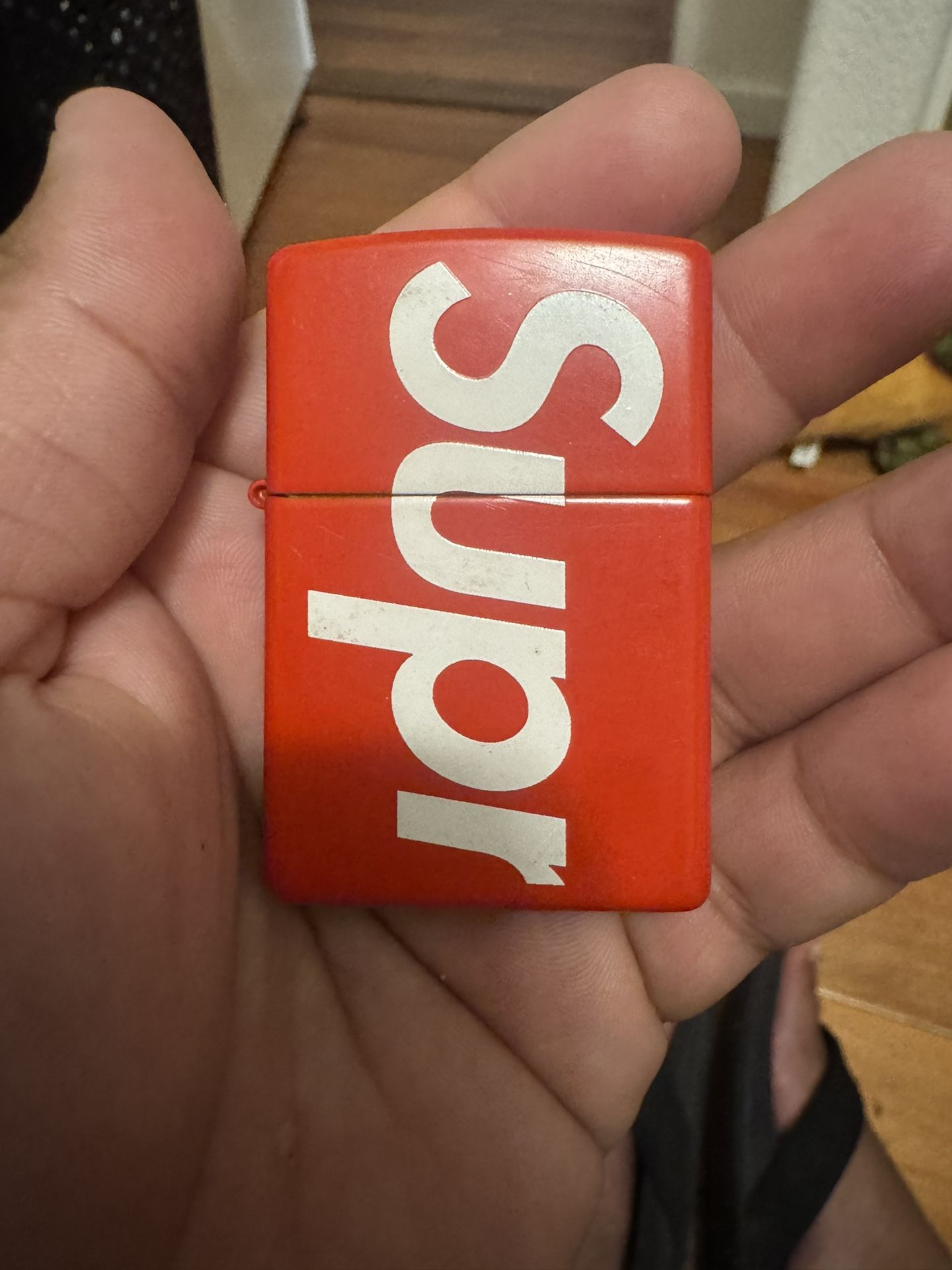 Supreme Zippo