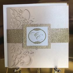 Lasercut invitations. Blush and rose gold glitter