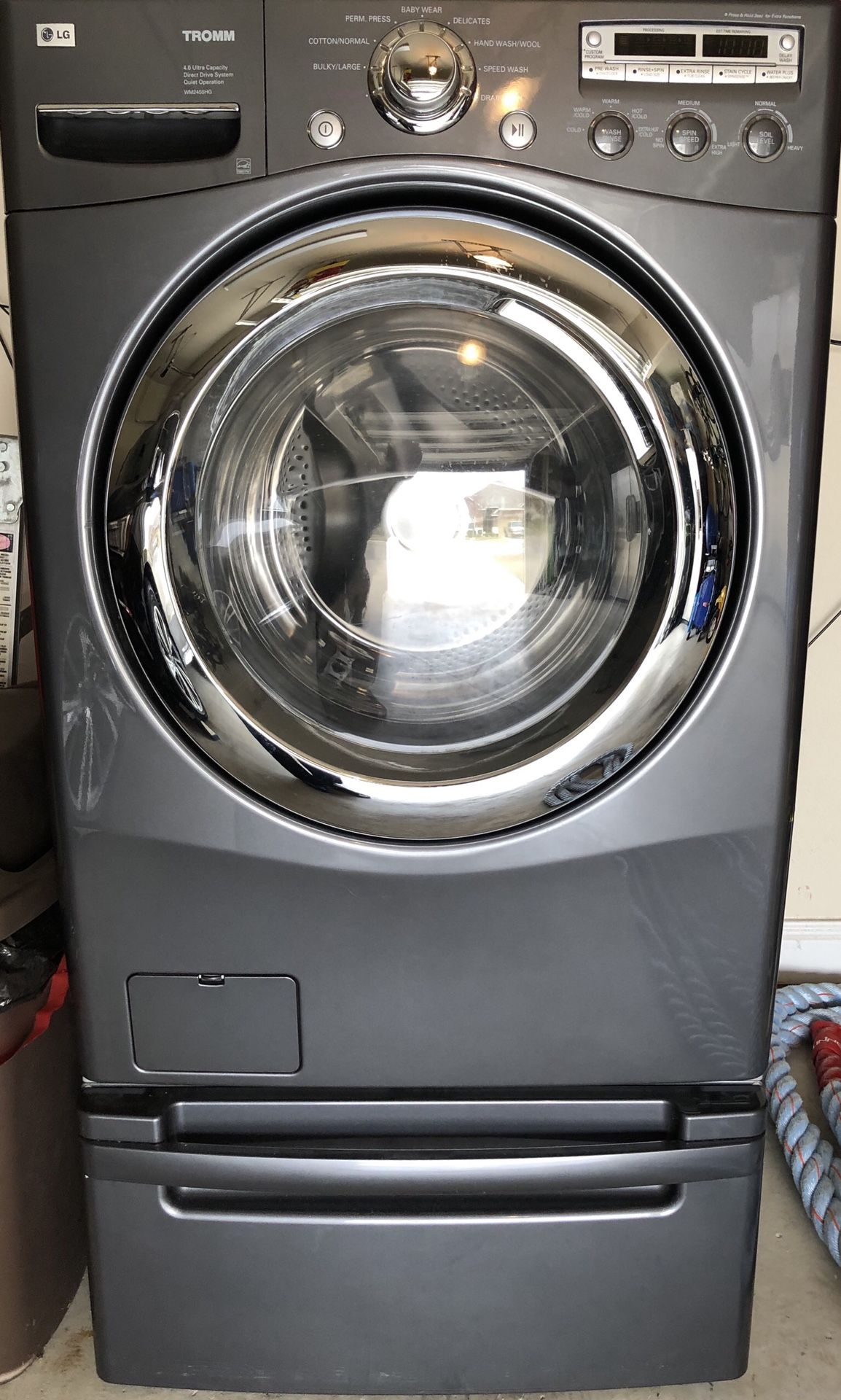 LG Tromm Washer and Dryer with pedestals for each