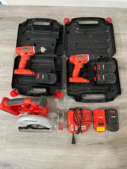 Black & Decker drills, saw, charger and batteries