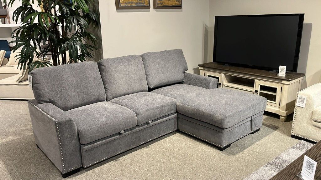 Morelia Exposed Feet With Faux Wood 2-Piece Sectional Pull-Out Bed And Right Chaise Hidden Storage
Homelegance$10 Down Payment And Financing Available
