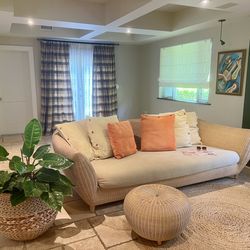 High-end Handcrafted European Wicker Sofa with matching ottoman.