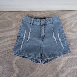 PrettyLittleThing Women's light wash high waisted Shorts Sz. 4
